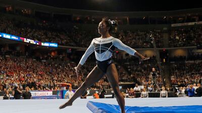Simone Biles competes in the floor exercise at NOW Arena in Chicago. USA TODAY Sports