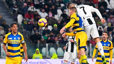 Juventus' Cristiano Ronaldo, top right, scores his side's second goal during the match between Juventus and Parma at the Allianz stadium in Turin. ANSA via AP