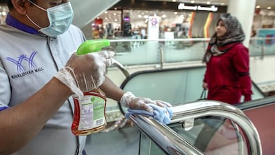 Cleaning operations have been stepped up at Khalidiyah Mall in Abu Dhabi, especially at popular touch points thoughout the building including hand rails and elevators. Victor Besa / The National