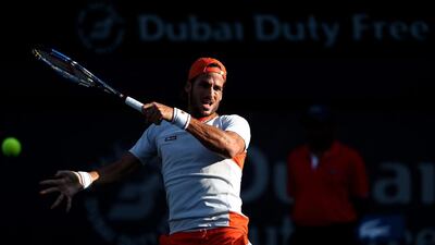 Feliciano Lopez of Spain in action against Guillermo Garcia-Lopez of Spain during day two of the ATP Dubai Duty Free Tennis Championship at the Dubai Duty Free Stadium on February 22, 2016 in Dubai, United Arab Emirates. (Photo by Warren Little/Getty Images)