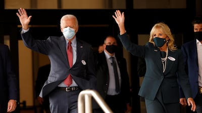 Democratic U.S. presidential nominee and former Vice President Joe Biden and his wife Jill wave as they depart after casting their votes in the 2020 U.S. presidential election in Wilmington, Delaware, Reuters