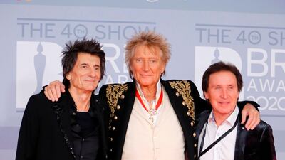British musicians Ronnie Wood, Rod Stewart and Kenney Jones arrive at the Brit Awards 2020 at The O2 Arena on Tuesday, February 18, 2020 in London, England. AFP