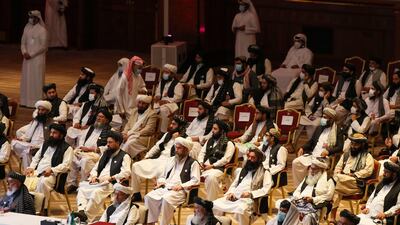 Members of the Taliban delegation attend the opening session of peace talks with the Afghan government in the Qatari capital Doha on September 12, 2020. AFP