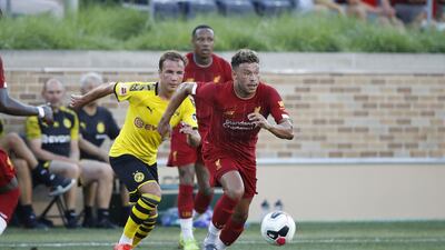Oxlade-Chamberlain makes a run for Liverpool. AFP