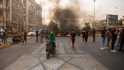 Supporters of Iraqi Shiite cleric Moqtada Al Sadr during a demonstration in Iraq's southern city of Basra. AFP