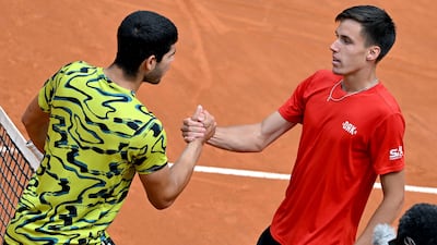 Fabian Marozsan, right, after beating Carlos Alcaraz in the third round of the Italian Open in Rome on May 15, 2023. EPA