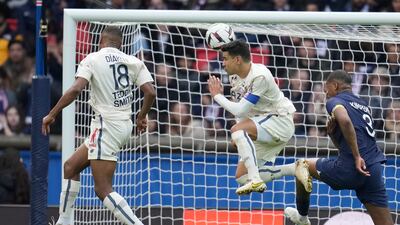 Lille's Bafode Diakite, left, pulls a goal back. AP