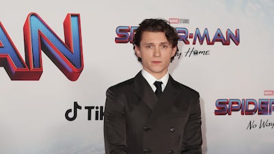 Tom Holland, in a black silk Prada double breasted suit, attends the 'Spider-Man: No Way Home' premiere in Los Angeles on December 13, 2021. EPA