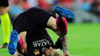 Barcelona’s Lionel Messi falls during the match against Athletic Bilbao. Ander Gillenea / AFP