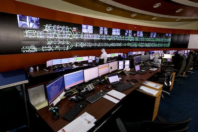The Dubai Metro operation control centre at Al Rashidiya. Screens show the position of trains on the system. Victor Besa / The National