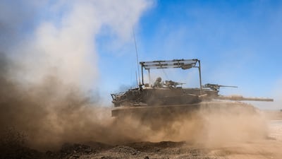 An Israeli tank drives along the ceasefire line between the Israeli-occupied Golan Heights and Syria. Reuters