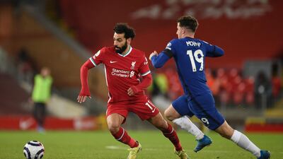 Liverpool's Mohamed Salah and Chelsea's Mason Mount battle for the bal. PA