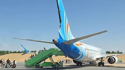 The flydubal Boeing 737-8 aircraft shows damage to its tail after landing in Saudi Arabia. Photo: Kann Media