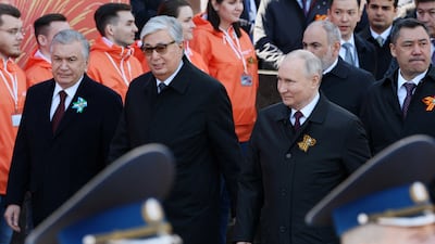 Mr Putin, Kazakh President Kassym-Jomart Tokayev and Uzbek President Shavkat Mirziyoyev attend the parade. Reuters