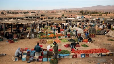 Amazigh villagers shop for fruits and vegetables on February 3, 2016, at a weekly local market in Kalaat M’Gouna, in Ouarzazate, Morocco.
