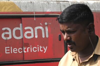 S&P Global Ratings cut its outlook on Adani Ports and SEZ and Adani Electricity Mumbai to negative. AFP
