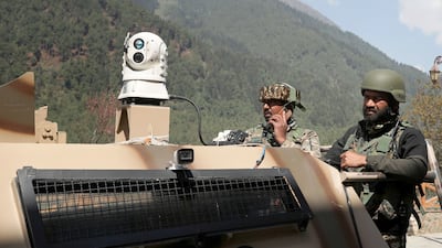 Indian paramilitary soldiers on duty in Pahalgam town after the killings of dozens of tourists there. EPA