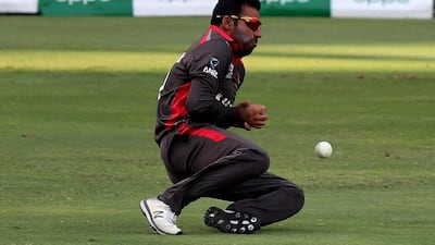 The UAE's Sultan Ahmad drops a catch. Chris Whiteoak / The National