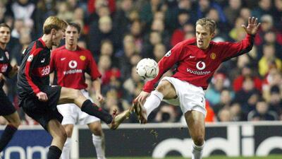 Defender: Phil Neville (Played 368 games for United, scoring eight goals). Getty