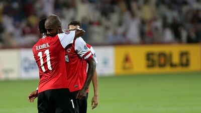 Grafite gets a hug from Ali Khaled and gives Al Ahli something to celebrate after scoring his 68th-minute goal against Al Saad fo Qatar for a 1-1 draw in their Group C match of the Asian Champions League at the Rashid Stadium in Dubai on March 12, 2014. Satish Kumar / The National