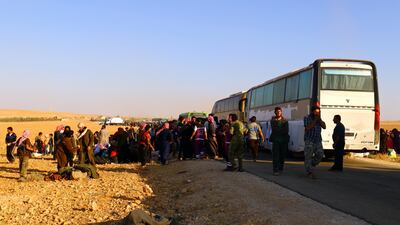 Syrian refugees arrive in Hama on August 3, 2017. Ammar Abdullah / Reuters