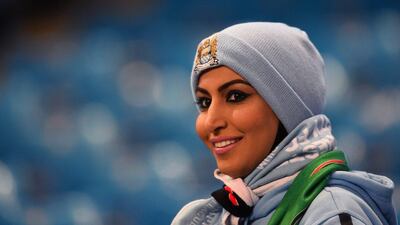 A Manchester City fan looks onto the pitch at the Etihad Stadium before Tuesday night's Champions League last 16 first leg match against Barcelona. Laurence Griffiths / Getty Images