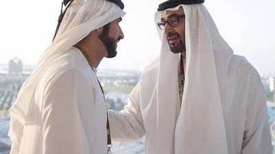Sheikh Hamdan bin Mohammed, Crown Prince of Dubai (L), and General Sheikh Mohammed bin Zayed, Crown Prince of Abu Dhabi Deputy Supreme Commander of the UAE Armed Forces (R), attend the final race of the Formula 1 Etihad Airways Abu Dhabi Grand Prix at Yas Marina Circuit. Mohamed Al Hammadi / Crown Prince Court - Abu Dhabi