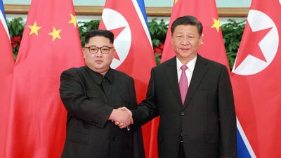 North Korean leader Kim Jong-un shakes hands with Chinese President Xi Jinping during their meeting in Dalian, China, 08 May 2018. EPA