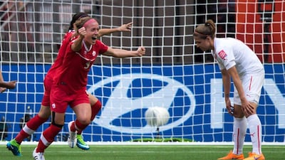 Canada's Josee Belanger, left, celebrates her goal, the winner against Switzerland on Sunday at the Women's World Cup in Vancouver. Darryl Dyck / The Canadian Press / AP / June 21, 2015