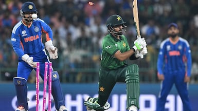 Pakistan's Babar Azam is clean bowled by India's Axar Patel during the 2026 ICC Men's T20 Cricket World Cup group stage match between India and Pakistan at the R Premadasa Stadium in Colombo on February 15, 2026. (Photo by Ishara S. KODIKARA / AFP)