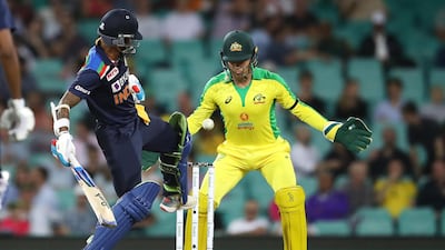 Shikhar Dhawan of India kicks the ball to stop it hitting his stumps during the Sydney ODI on Friday. Gettyu