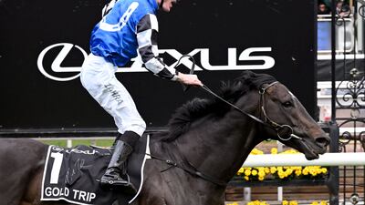 Gold Trip, ridden by Mark Zahra, crosses the line to win the A$8 million Melbourne Cup horse race at Flemington Racecourse on November 1, 2022. AFP