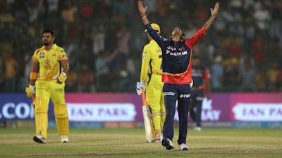 Delhi Daredevils leg-spinner Sandeep Lamichhane, right, took the wicket of Chennai Super Kings batsman Suresh Raina on Friday night. Manish Swarup / AP Photo