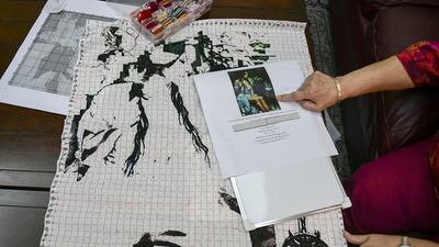 Varma chooses an image, prints it on an A3-size sheet then squares it off into 10 by 10 squares and then transfers on to the fabric that will be cross stitched