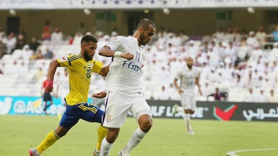 Al Ain player Saeed Al Kathiri, right, in action against Al Dhafra. Courtesy: Al Ittihad
