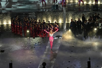 Beyonce walks across the hotel's Skyblaze water feature. Getty Images