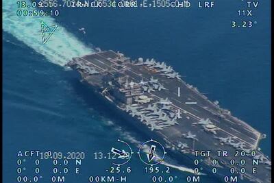 A handout picture released by the IRGC website last week reportedly shows the USS Nimitz Aircraft carrier prior to entering the Strait of Hormuz. EPA