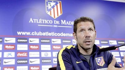 Atletico Madrid manager Diego Simeone speaks at a news conference on May 10, 2014. Neutrals may admire what Simeone and his team have accomplished, but that does not mean they necessarily want Atletico to win the Primera Liga. Fernando Alvarado / EPA
