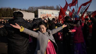 Students participate in a "mass dance" as part of celebrations marking the birthday of late North Korean leader Kim Jong Il, in Pyongyang. AFP