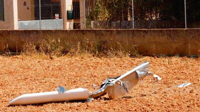 The wreckage of an aircraft is pictured on August 25, 2019 in a field in Inca, after seven people including two children were killed in a midair collision between a helicopter and a light aircraft over Spain's Mallorca island. AFP / STRINGER