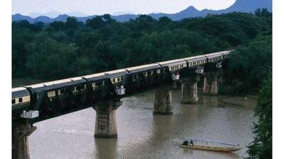 The Eastern & Oriental Express crosses the bridge over the River Kwai in Thailand. Ian Lloyd / Orient-Express Hotels (UK) Ltdver