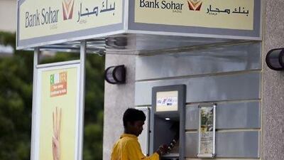 Bank Dhofar is exploring a tie-up with Bank Sohar that could create a new financial group with about US$10 billion in assets. Silvia Razgova / The National