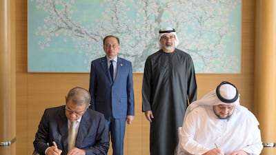 Sheikh Khaled bin Mohamed, Crown Prince of Abu Dhabi, and Anwar Ibrahim, Prime Minister of Malaysia, look on as Mohamed Alsuwaidi, UAE Minister of Investment, and Saifuddin Nasution Ismail, Malaysia’s Minister of Home Affairs, initial the agreement. Sheikh Tahnoun bin Zayed, Deputy Ruler of Abu Dhabi and National Security Adviser was in attendance. Wam