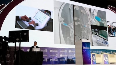 A doctor operating remotely from Abu Dhabi on a patient in South Korea. Wajod Alkhamis / The National