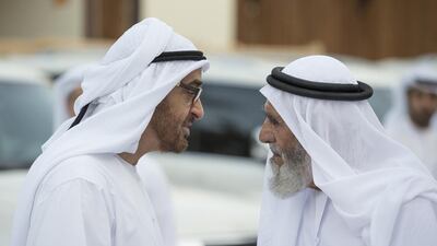 Sheikh Mohammed bin Zayed speaks with Mubarak bin Garan Al Mansoori. Ryan Carter / Crown Prince Court - Abu Dhabi