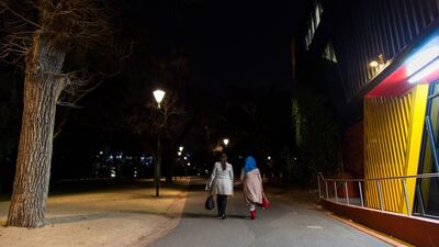 7:39pm - Tasneem leaves the Punt Road Oval with her friend Rima Darwiche to return home for the night.