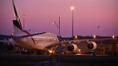 An Emirates A380 parked in front of the Airbus plant. Remy Gabalda / AFP
