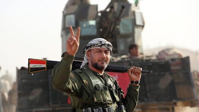 Shiite fighters from Iraq’s Hashed Al Shaabi militias advance towards the village of Salmani, south of Mosul, on October 30, 2016. Ahmad Al Rubaye / AFP