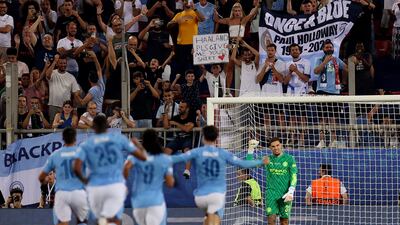 Manchester City players celebrate after winning the penalty shootout. Reuters