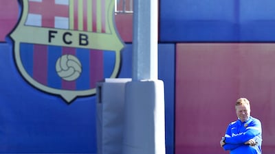 Barcelona's Dutch coach Ronald Koeman heads a training session. AFP